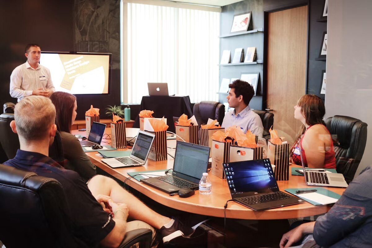 A consultant presenting a proposal in a productive client meeting