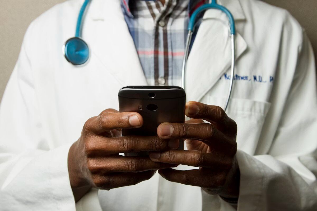 A pharmacist consulting with a patient
